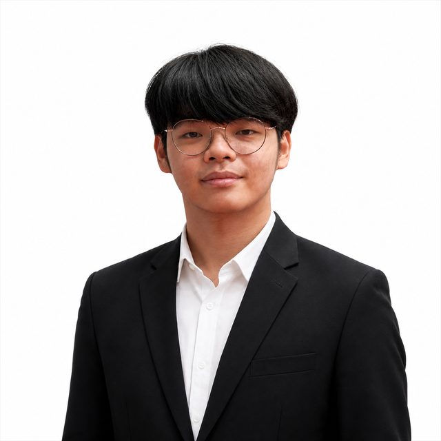 Elbert Hutady in a black suit and white shirt